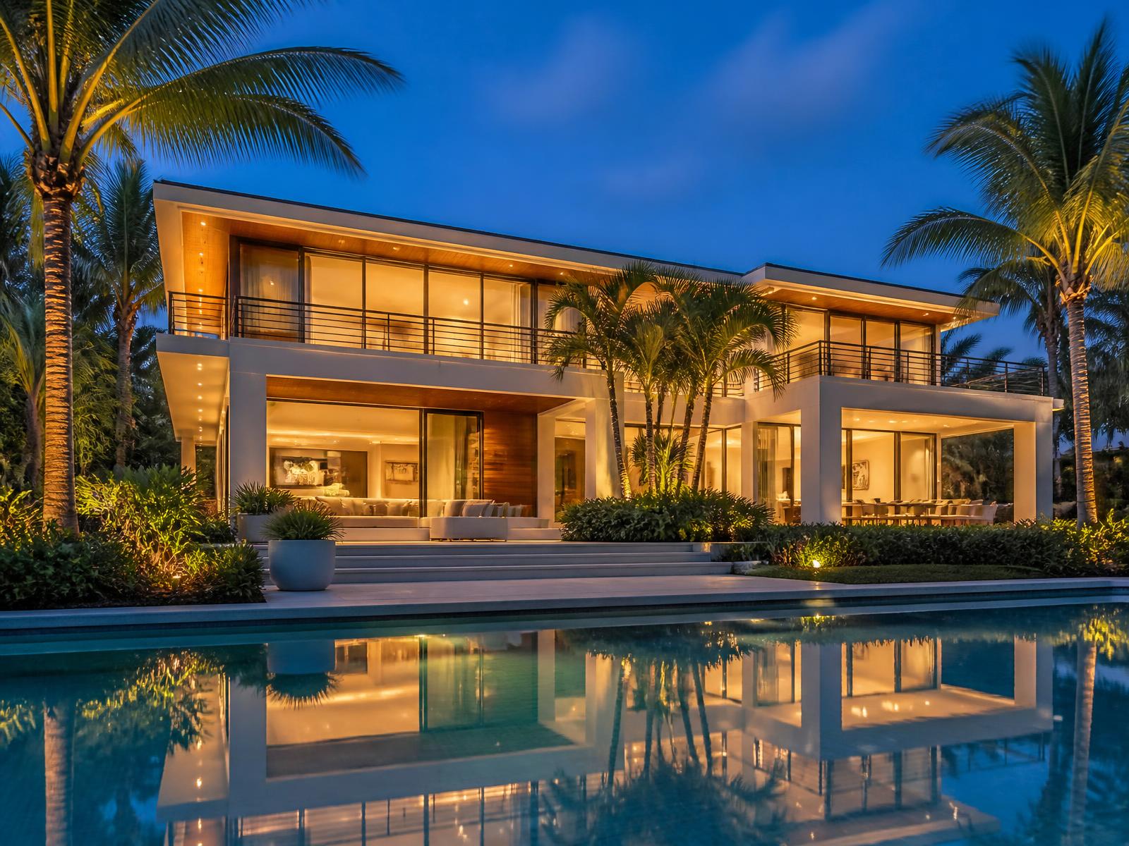 Modern coastal home exterior at dusk